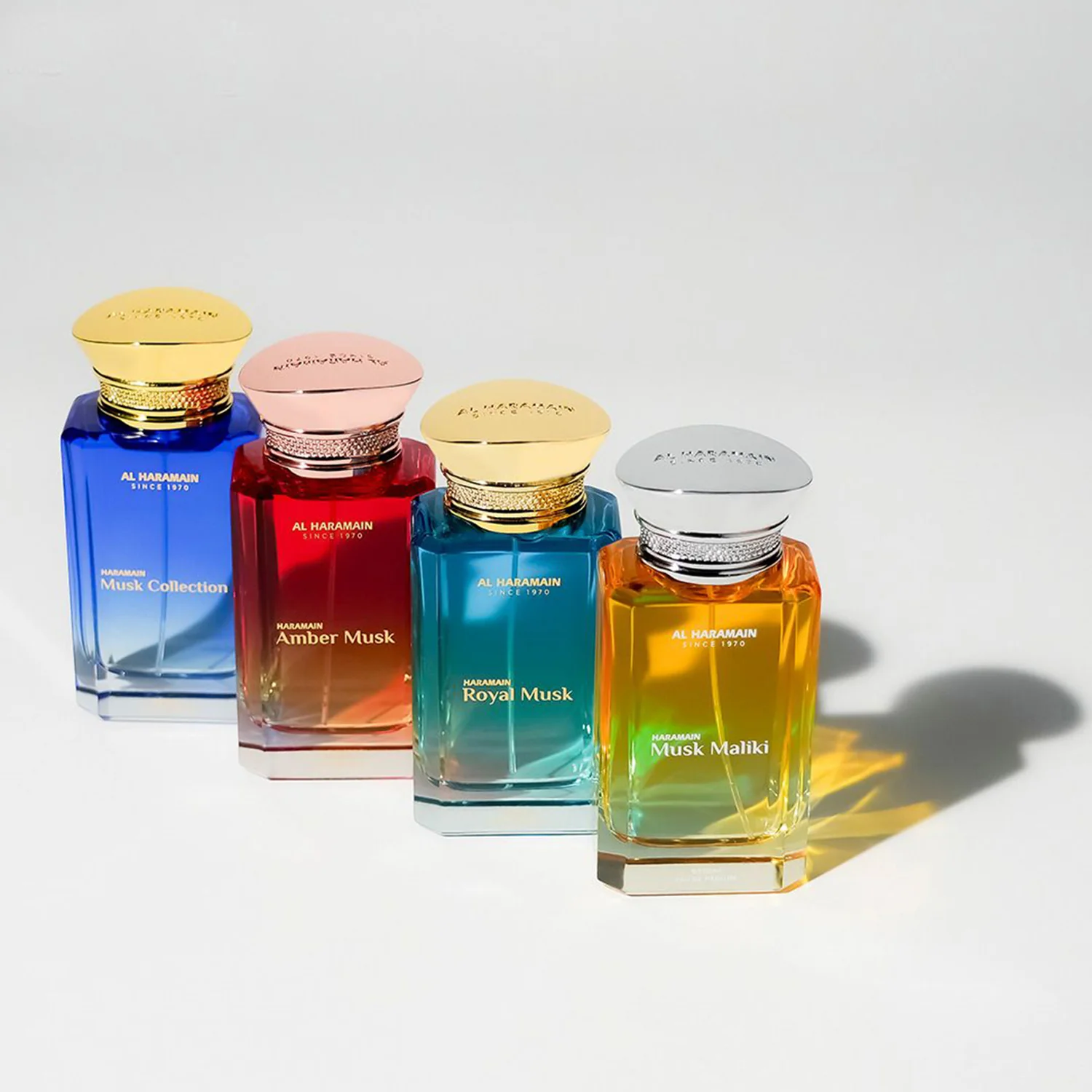 HARAMAIN MUSK COLLECTION GIFT SET (AMBER 100ML EDP+COLLECTION 100ML EDP+ROYAL 100ML EDP+MALIKI 100ML EDP)+ REFILLABLE ATOMIZER - Image 3